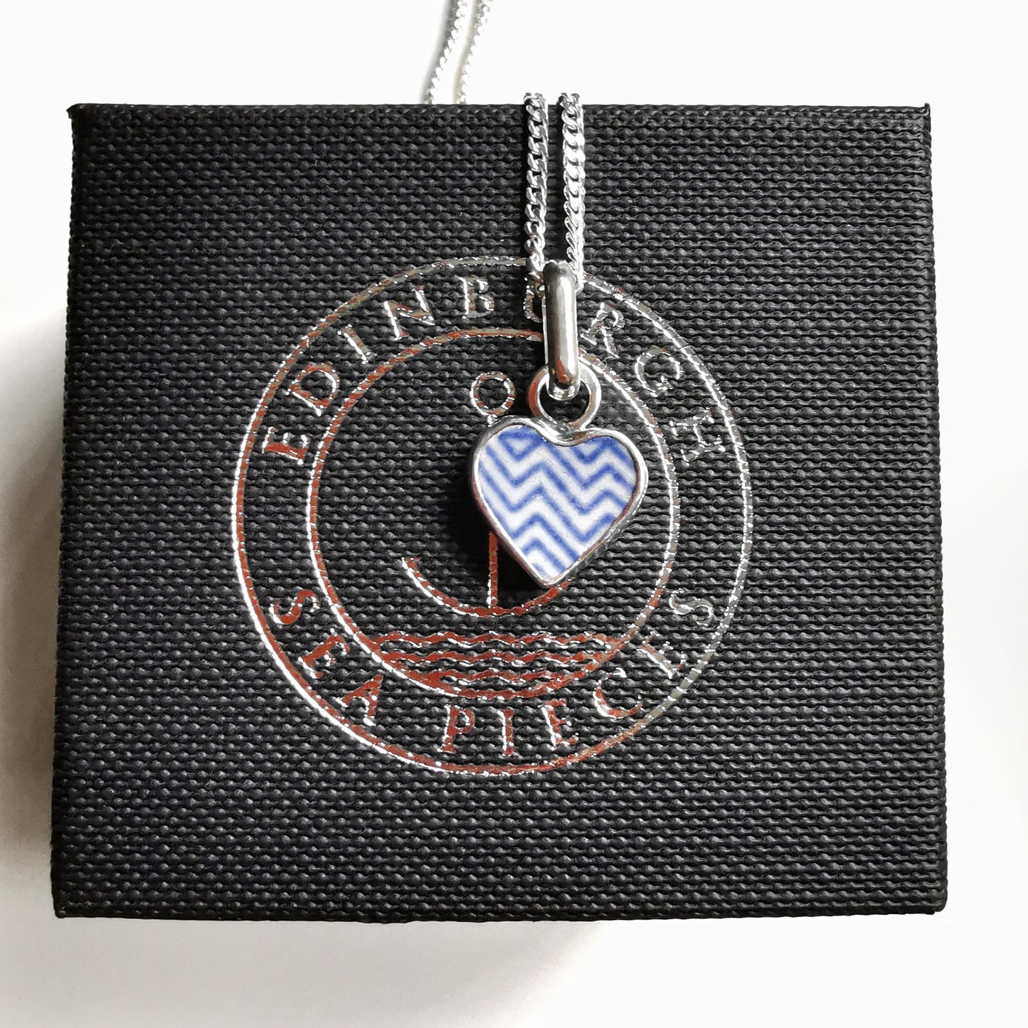 Scottish beach pottery necklace -blue and white chevron pattern, sterling silver heart pendant.