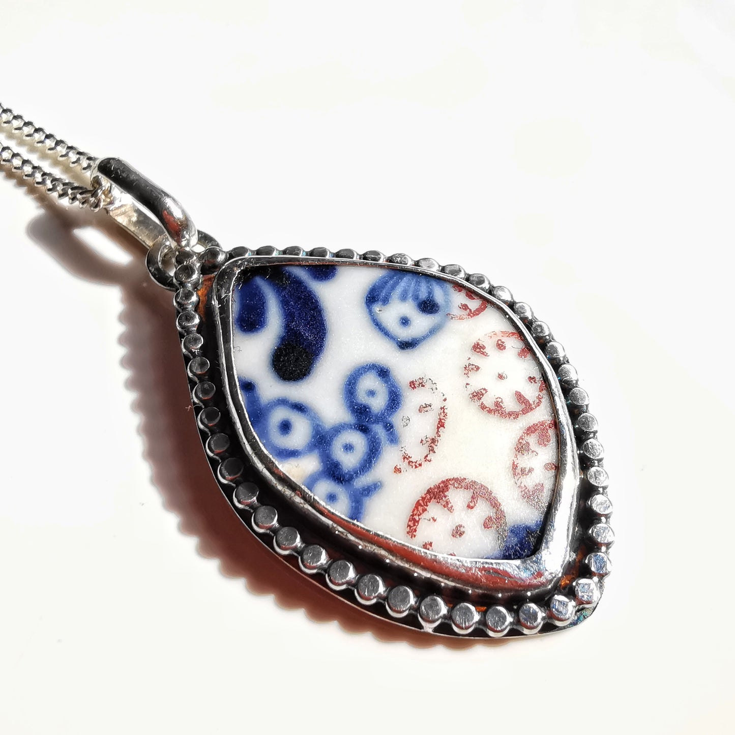 Scottish blue and white sea porcelain & sterling silver pendant.