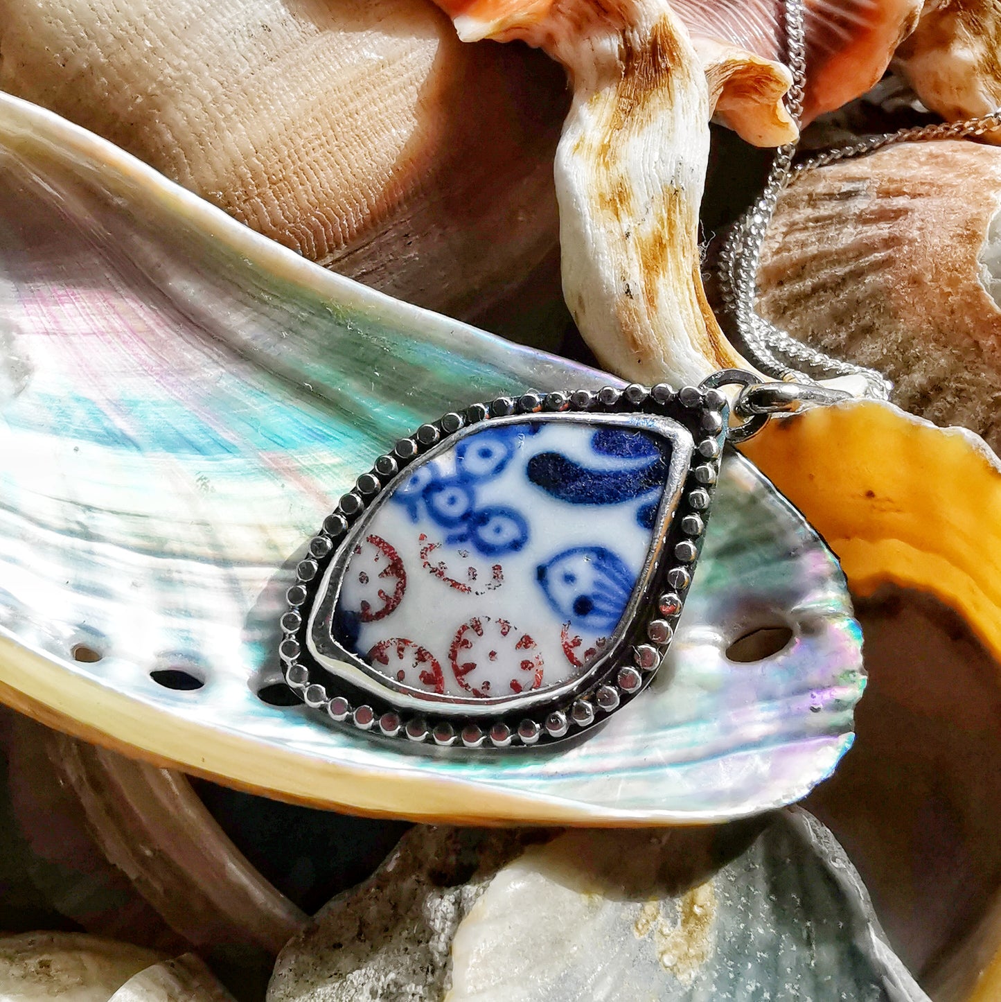 Scottish blue and white sea porcelain & sterling silver pendant.