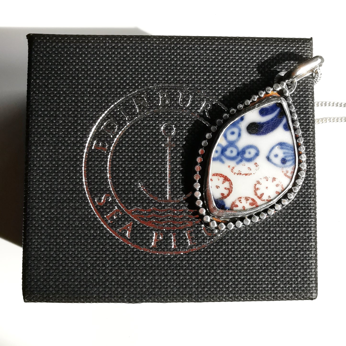 Scottish blue and white sea porcelain & sterling silver pendant.