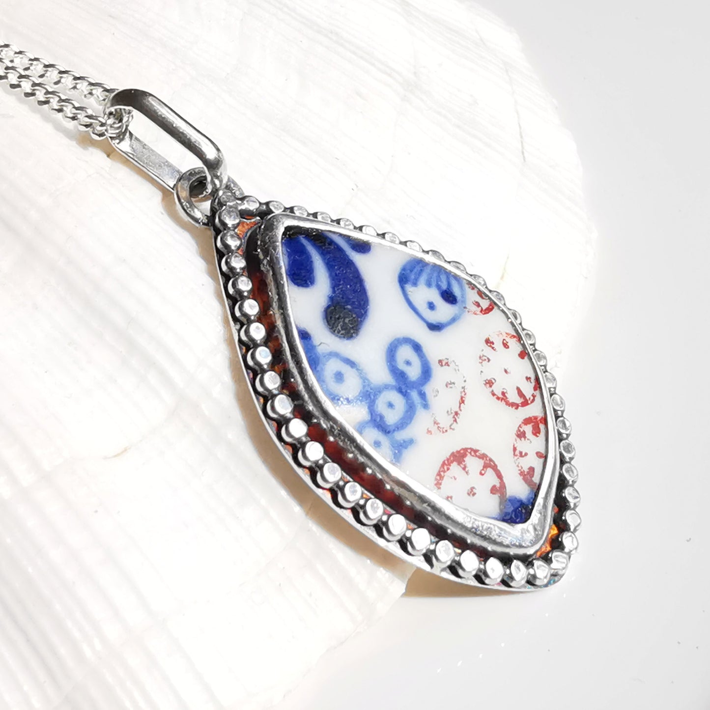 Scottish blue and white sea porcelain & sterling silver pendant.