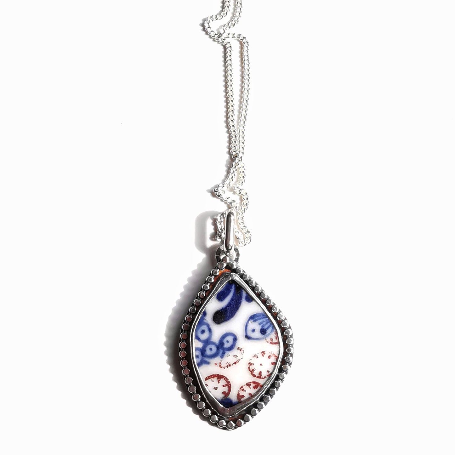 Scottish blue and white sea porcelain & sterling silver pendant.