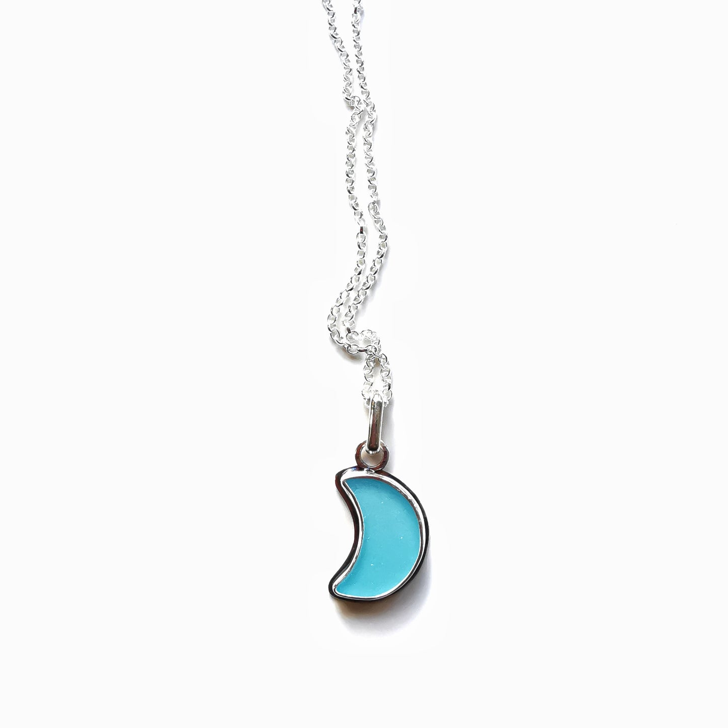 Aqua blue crescent moon sea glass & sterling silver pendant.