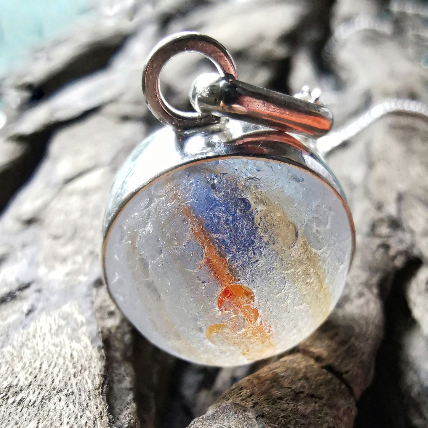 Scottish orange and blue sea glass marble & sterling silver pendant.