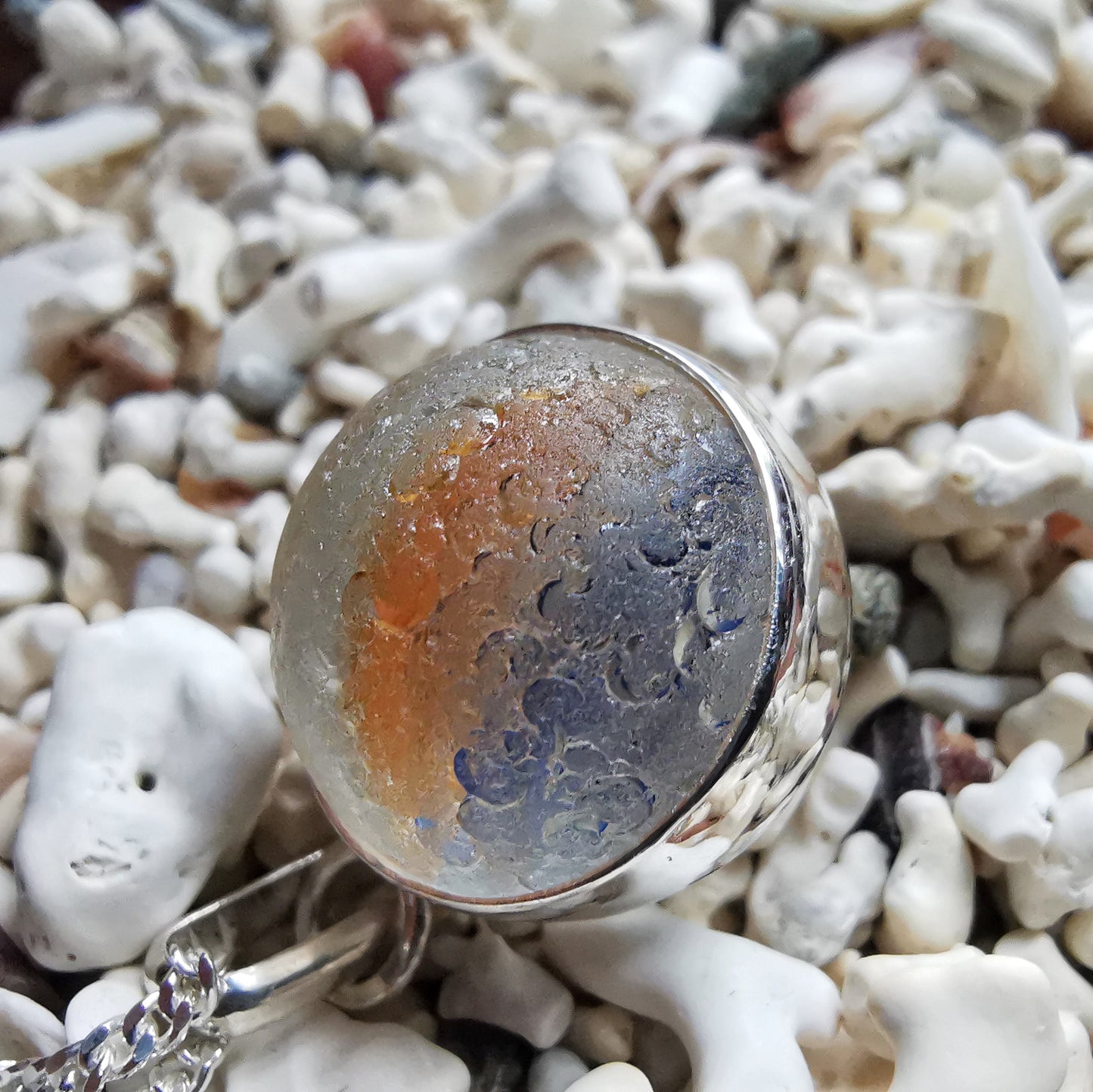Scottish orange and blue sea glass marble & sterling silver pendant.