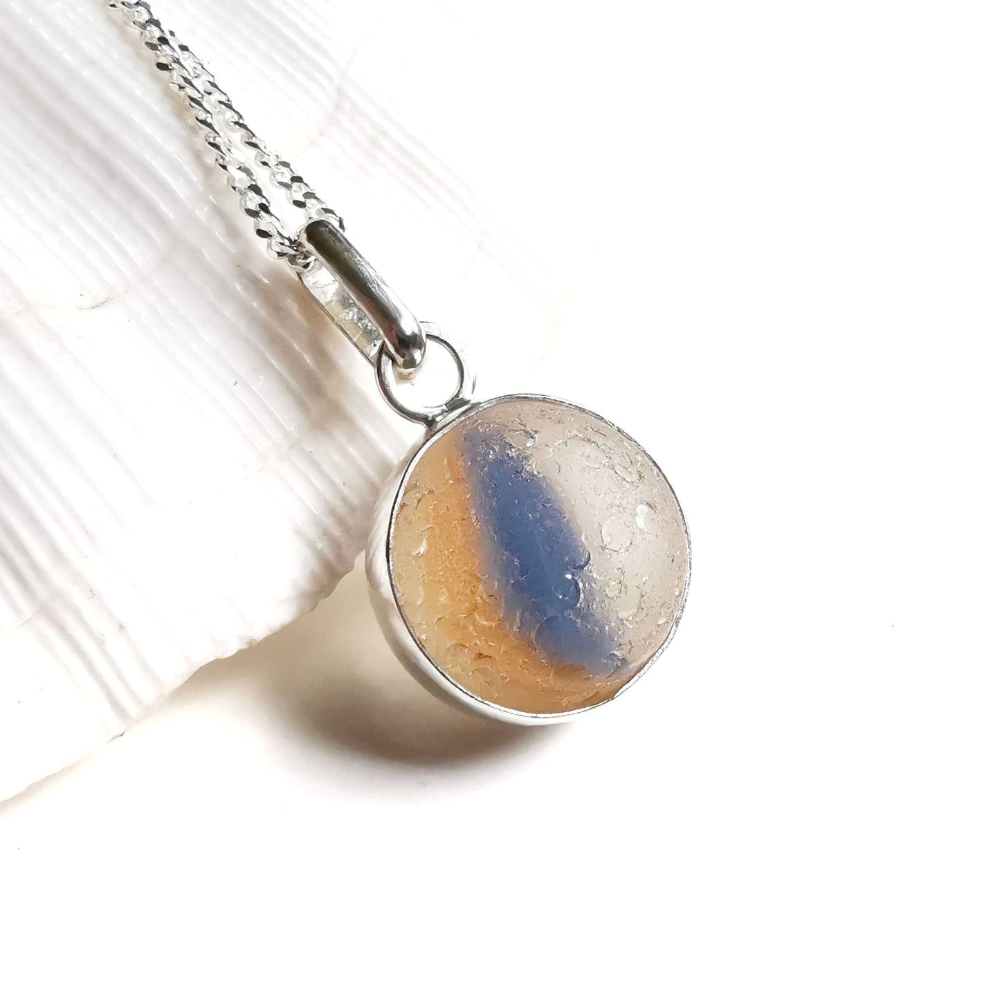 Scottish orange and blue sea glass marble & sterling silver pendant.
