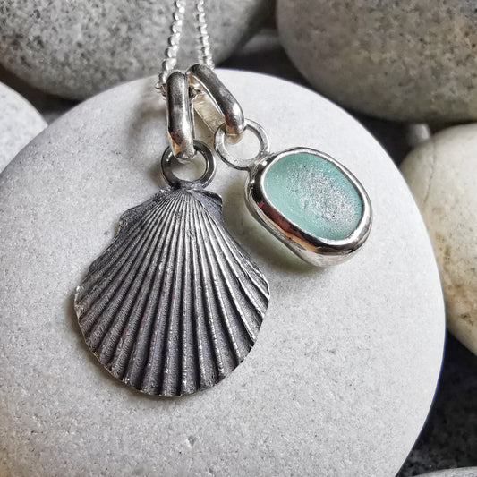 Seafoam sea glass and silver shell pendants duo.