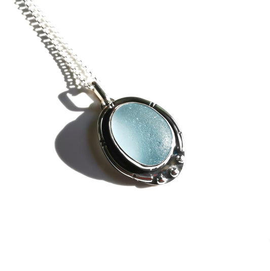 Scottish light blue sea glass & sterling silver pendant.