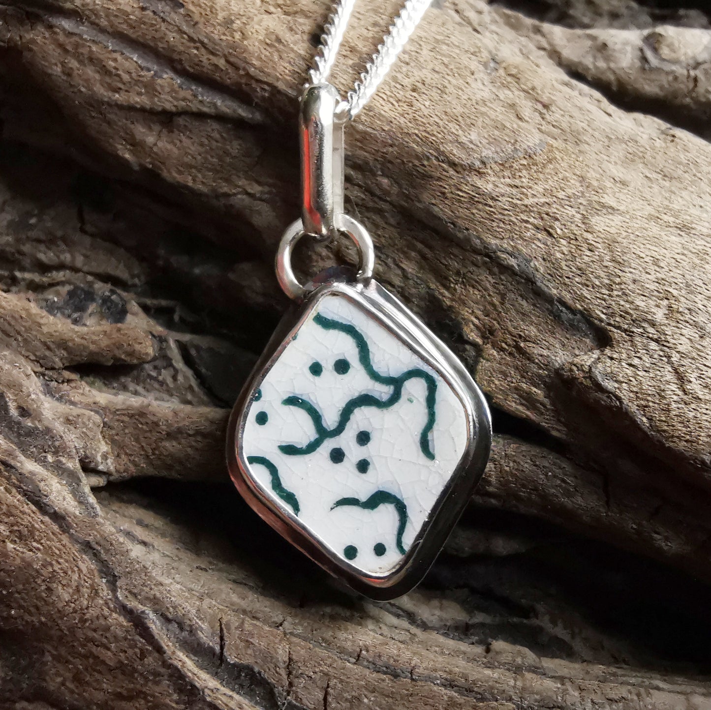 Scottish green and white "little ghosts" sea pottery & sterling silver pendant.
