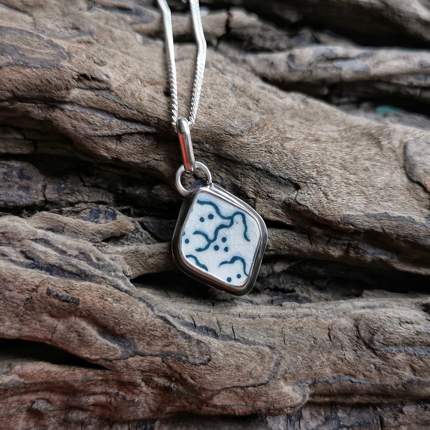 Scottish green and white "little ghosts" sea pottery & sterling silver pendant.
