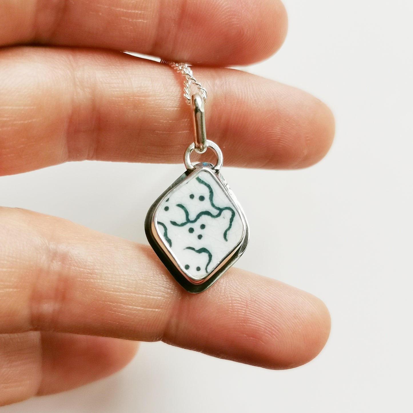 Scottish green and white "little ghosts" sea pottery & sterling silver pendant.