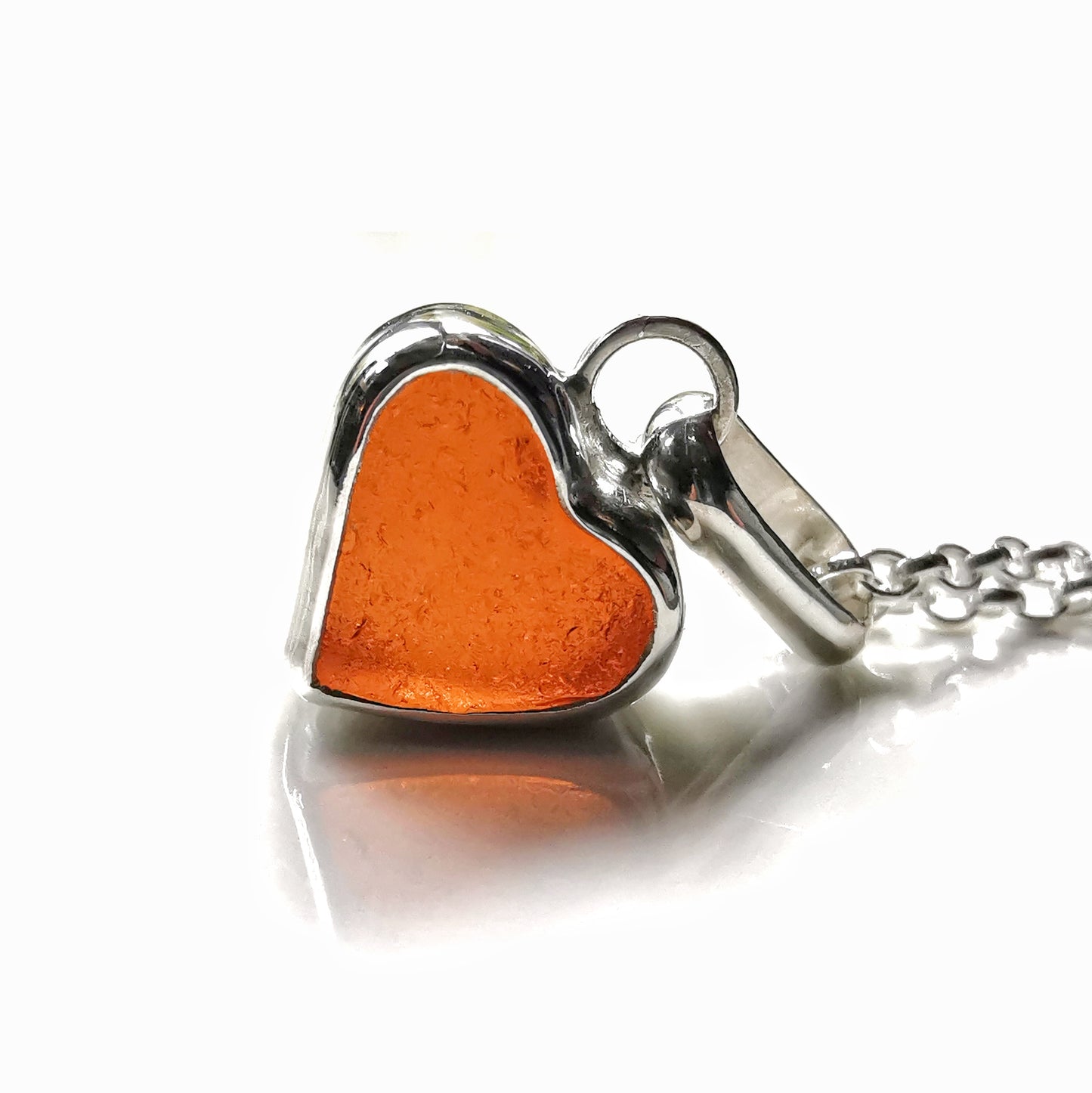 Scottish UV deep orange sea glass heart & sterling silver pendant.