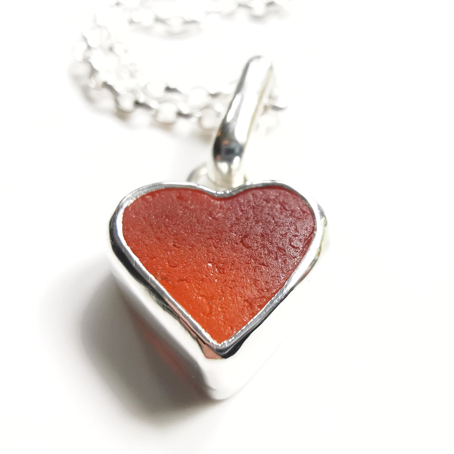 Scottish UV deep orange sea glass heart & sterling silver pendant.