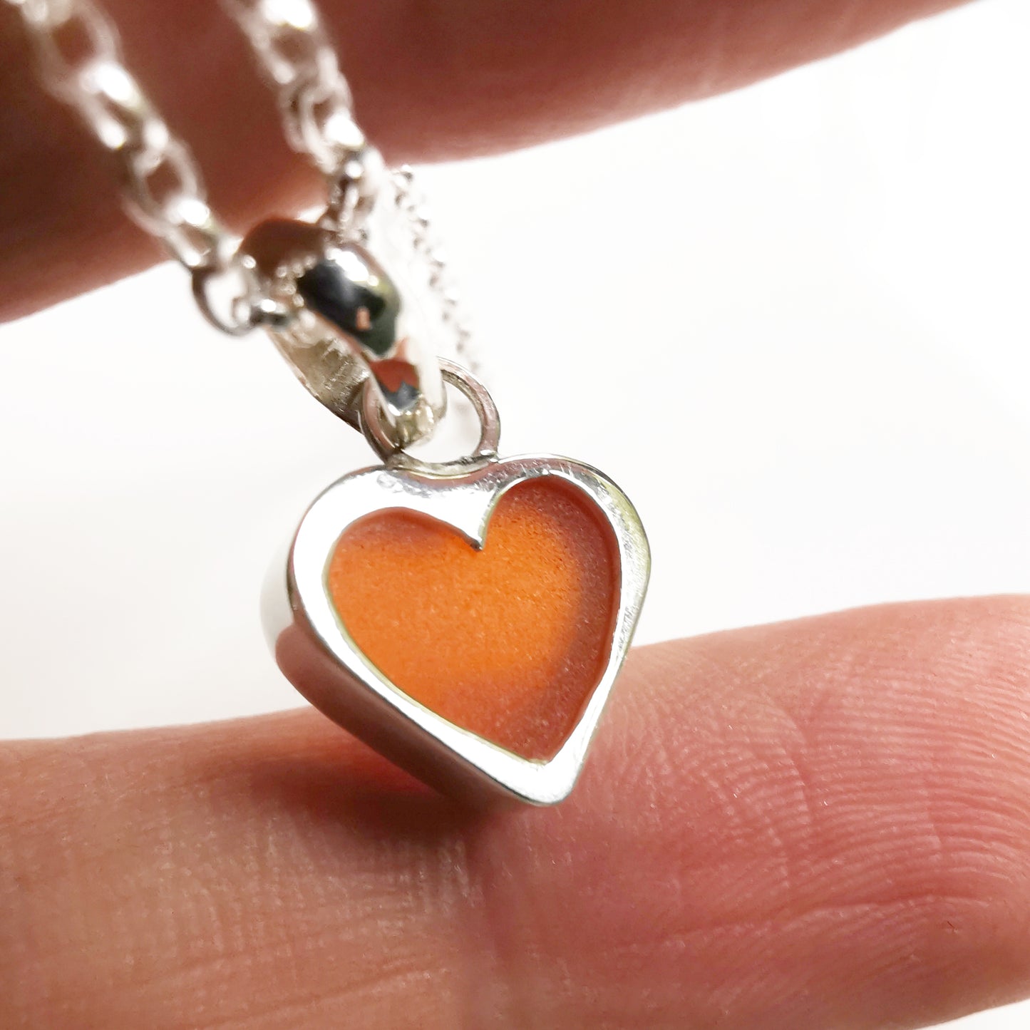 Scottish UV deep orange sea glass heart & sterling silver pendant.