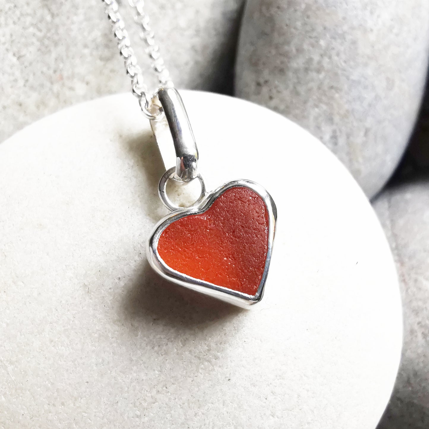 Scottish UV deep orange sea glass heart & sterling silver pendant.