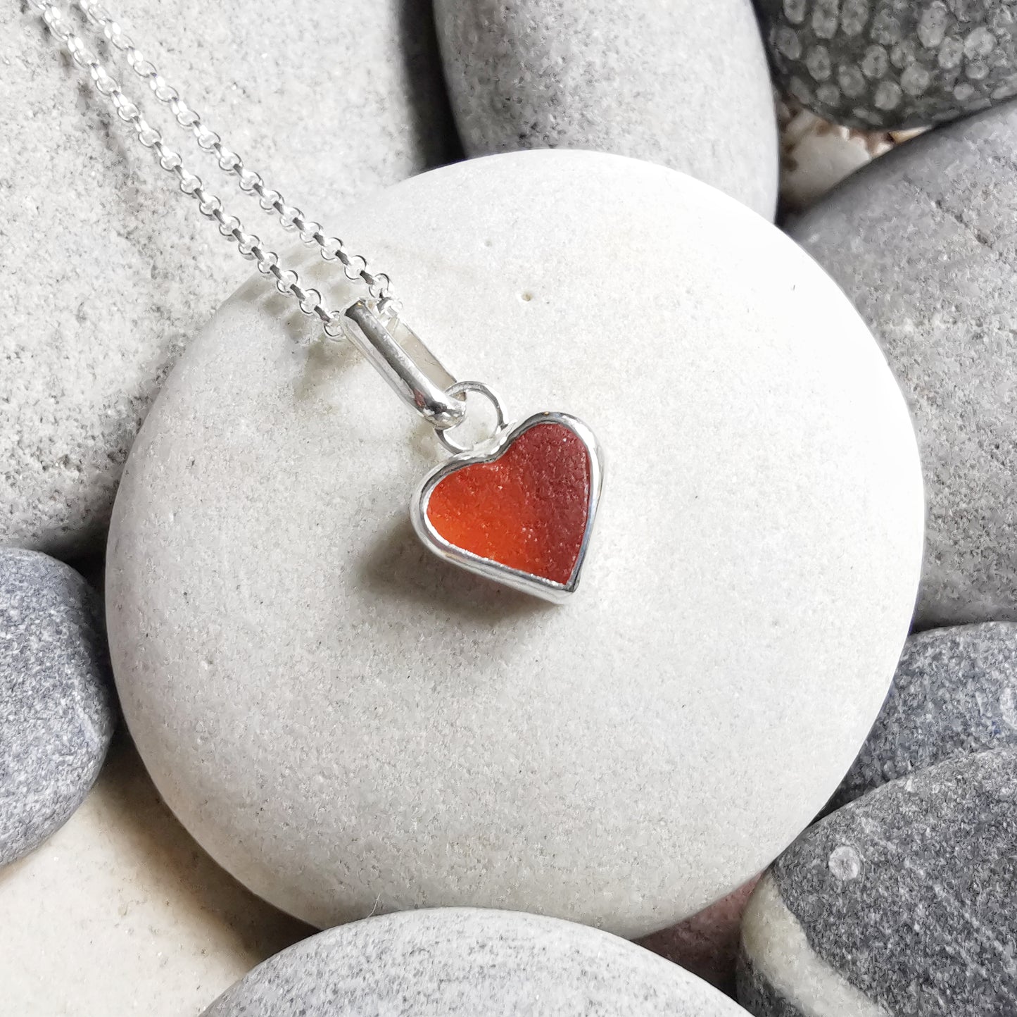 Scottish UV deep orange sea glass heart & sterling silver pendant.
