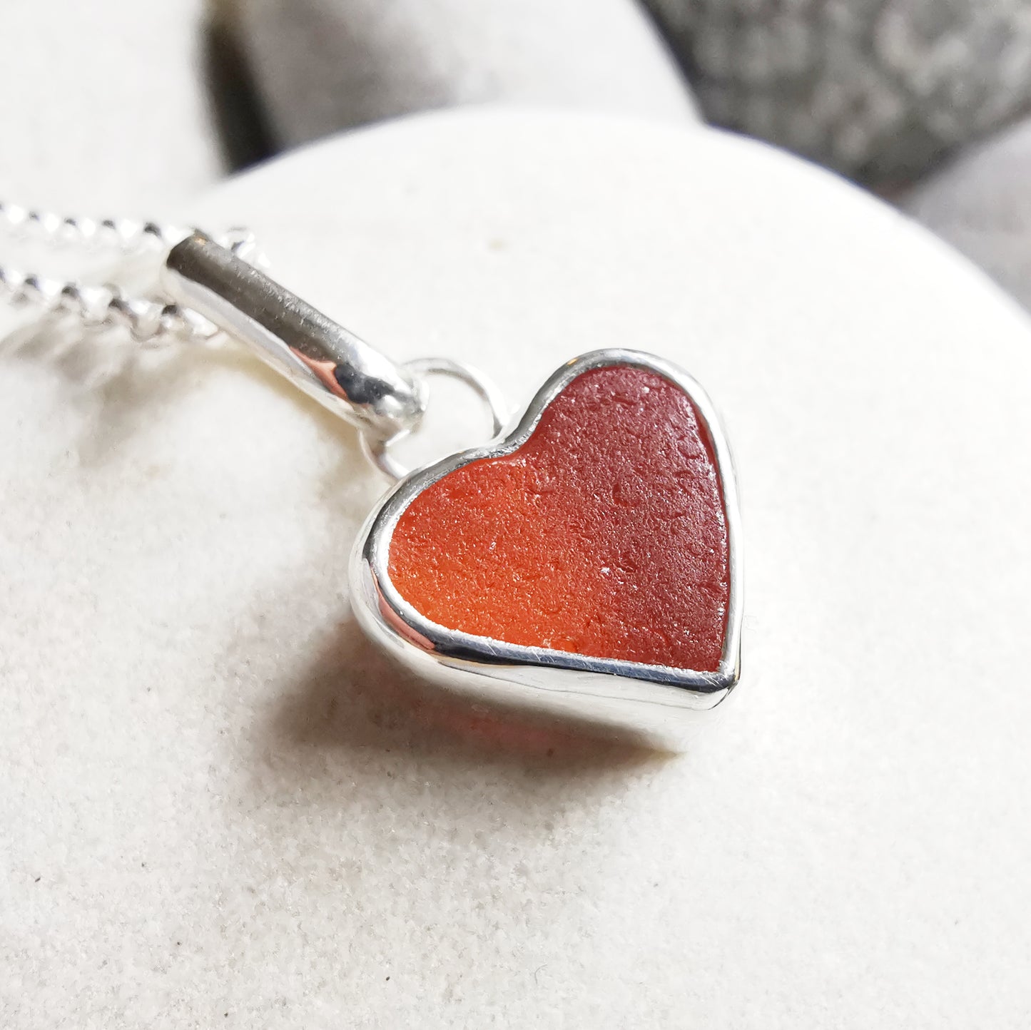 Scottish UV deep orange sea glass heart & sterling silver pendant.