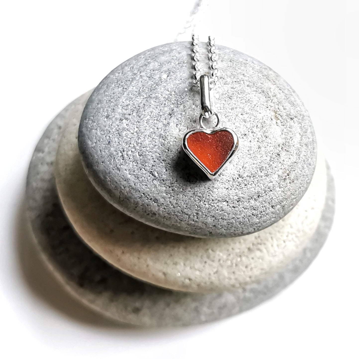 Scottish UV deep orange sea glass heart & sterling silver pendant.