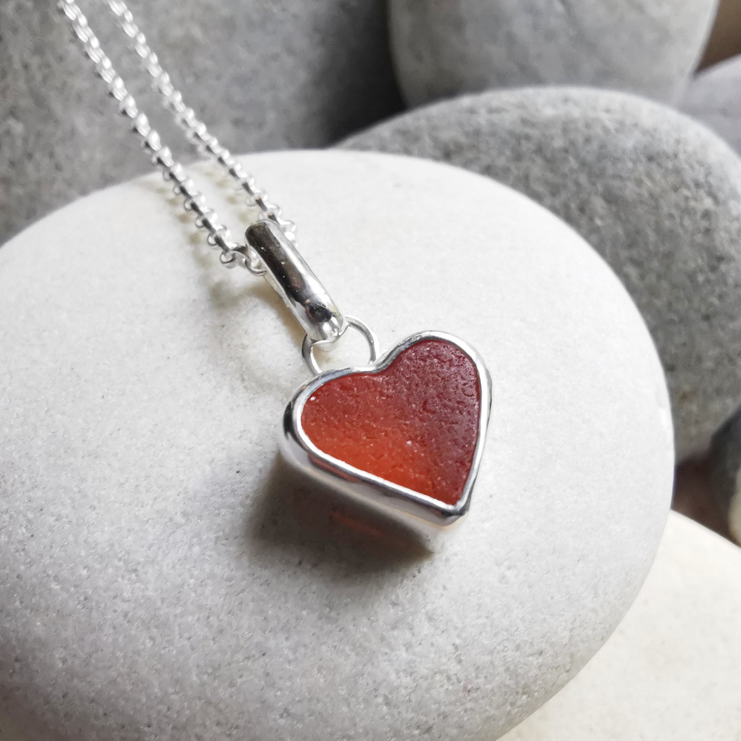 Scottish UV deep orange sea glass heart & sterling silver pendant.