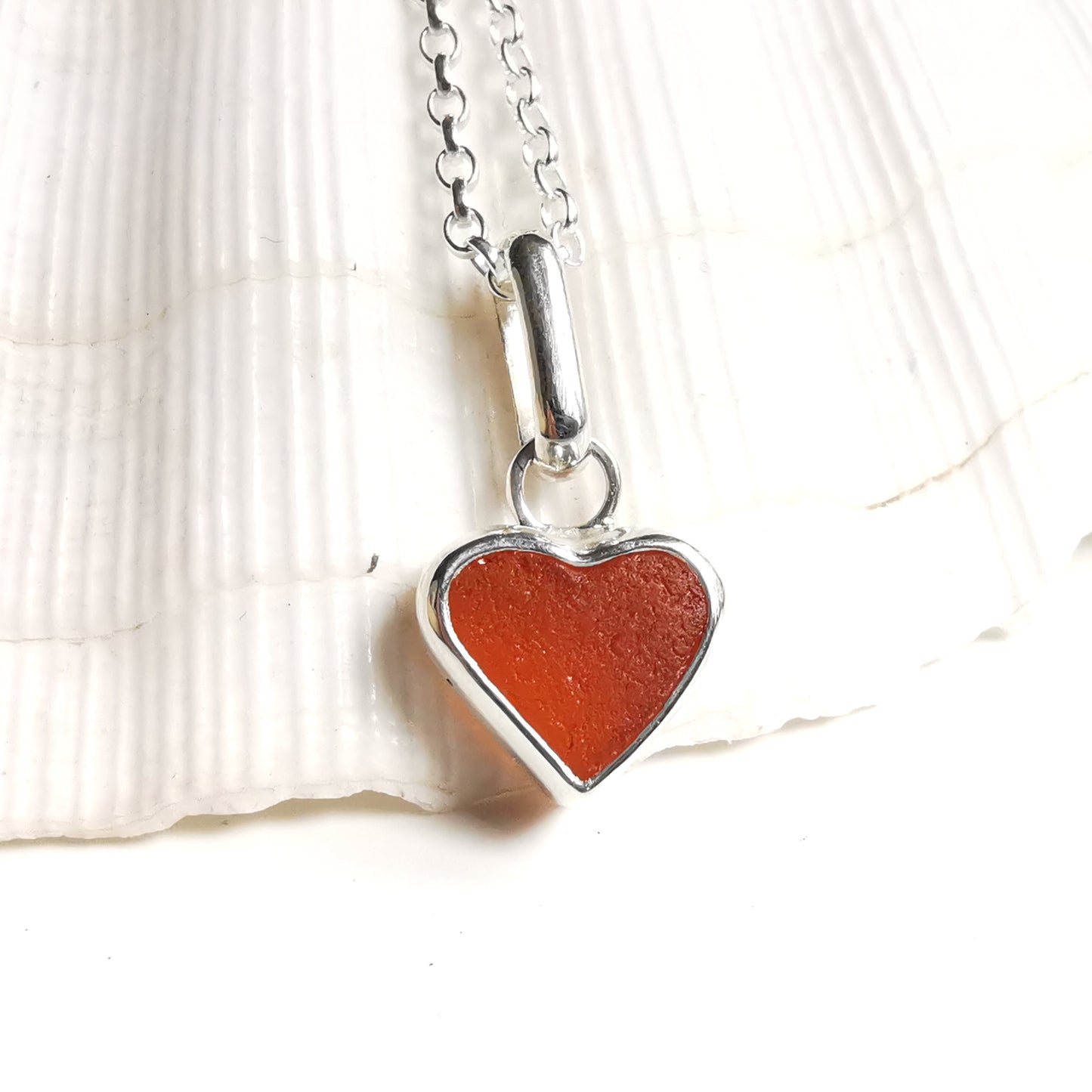 Scottish UV deep orange sea glass heart & sterling silver pendant.