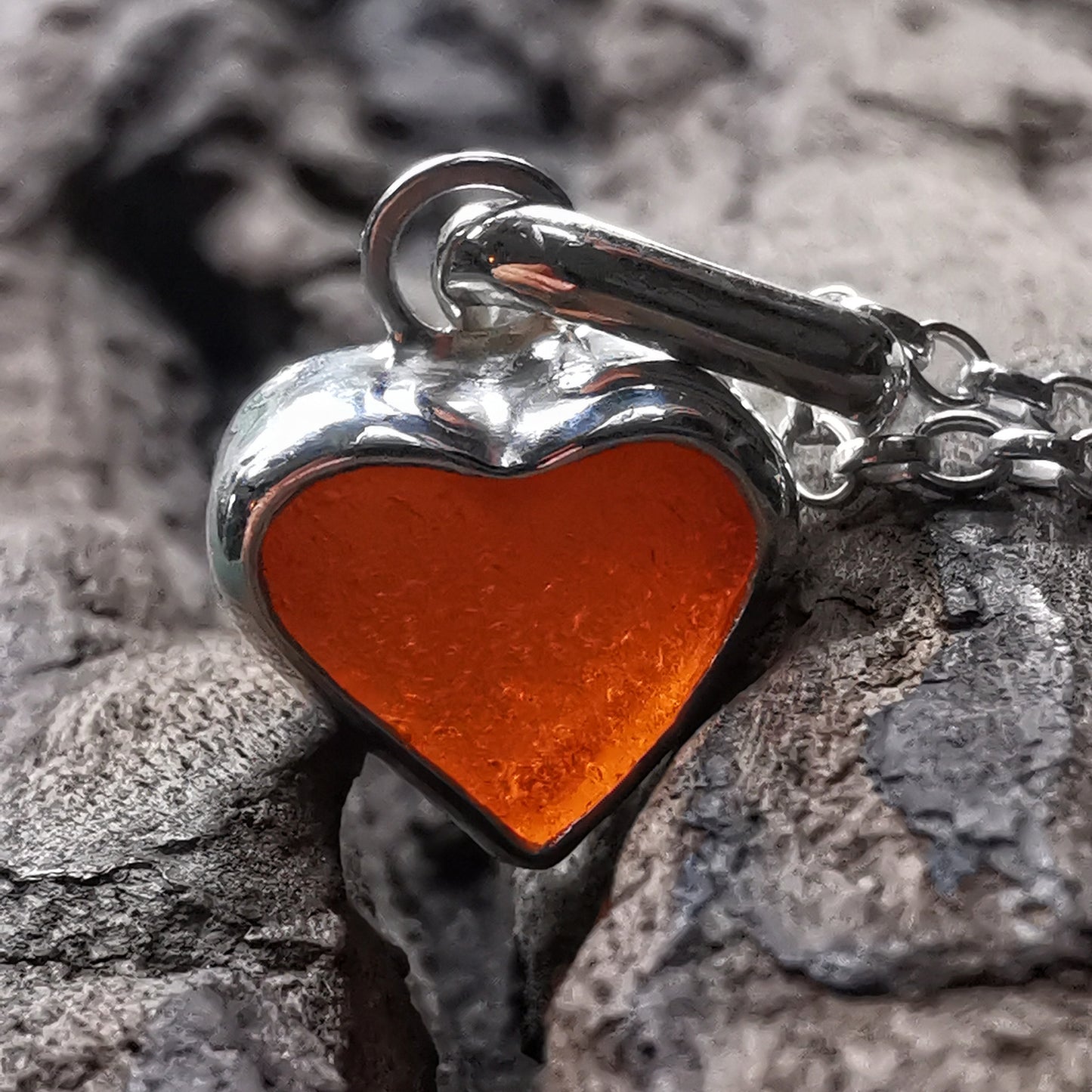 Scottish UV deep orange sea glass heart & sterling silver pendant.