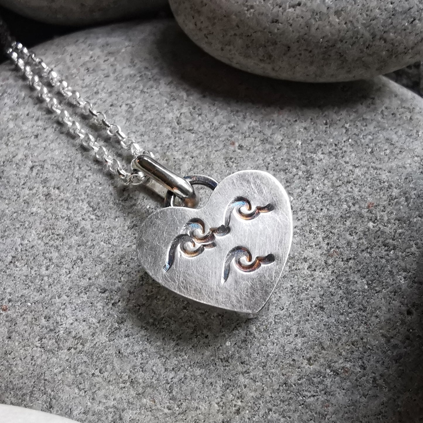 Scottish black sea glass heart & sterling silver pendant.