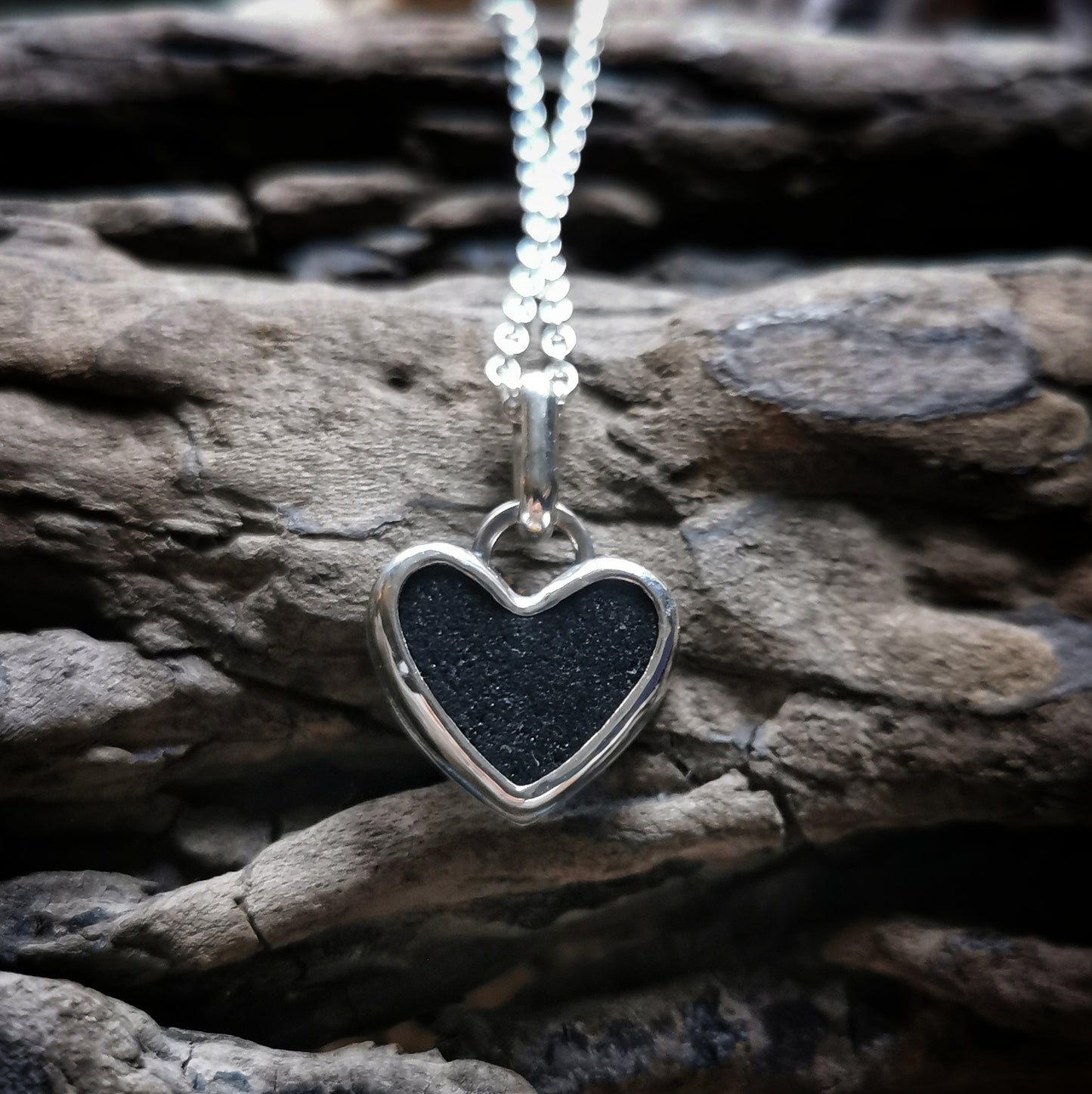 Scottish black sea glass heart & sterling silver pendant.