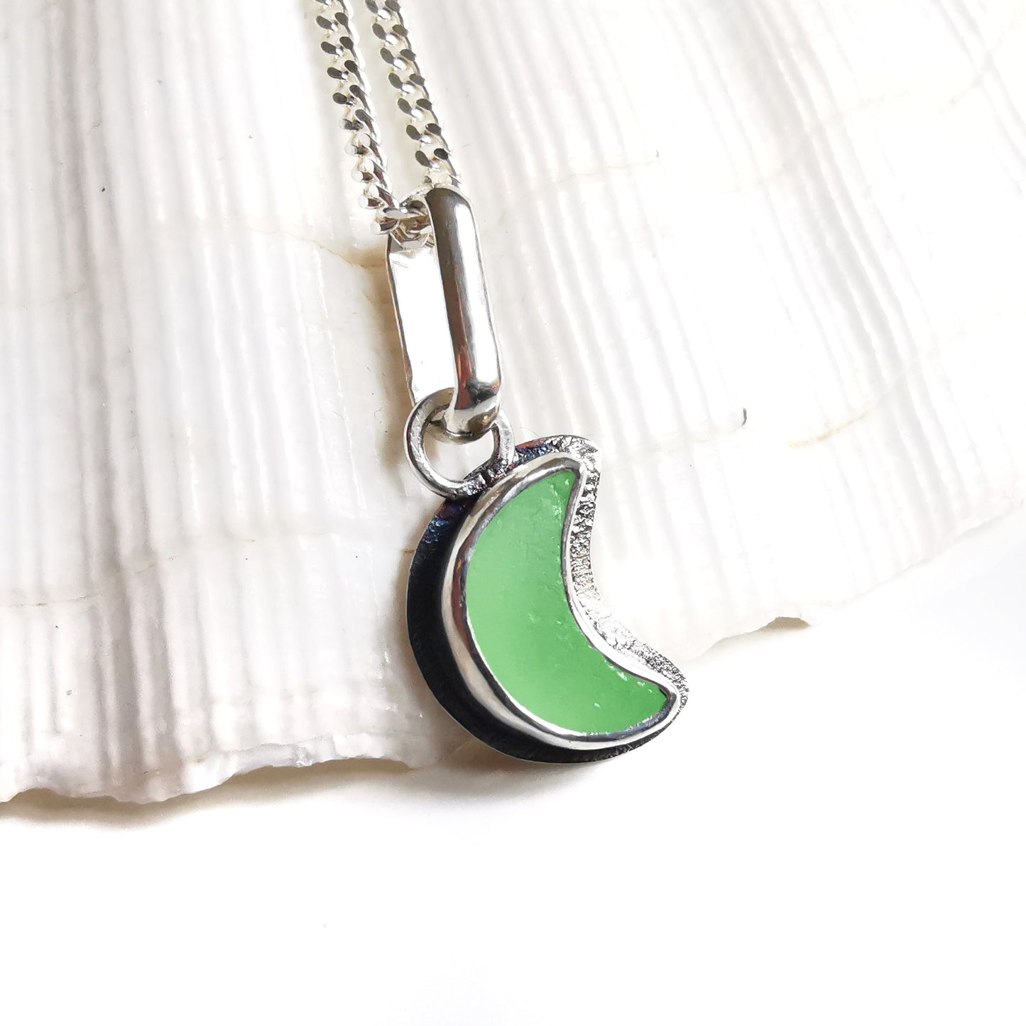 Reserved for Gatia.Tiny Scottish UV crescent moon sea glass & sterling silver pendant.