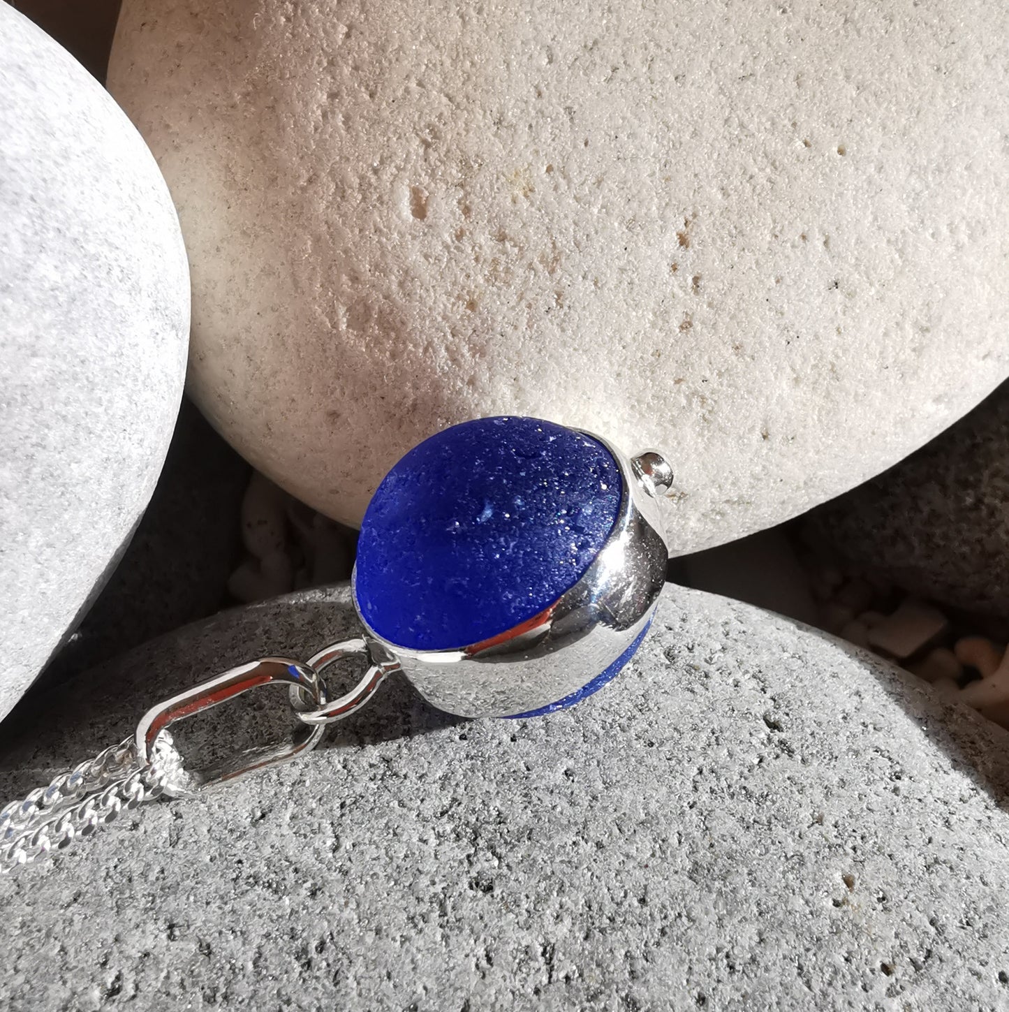 Scottish cobalt blue and white sea glass marble & sterling silver pendant.