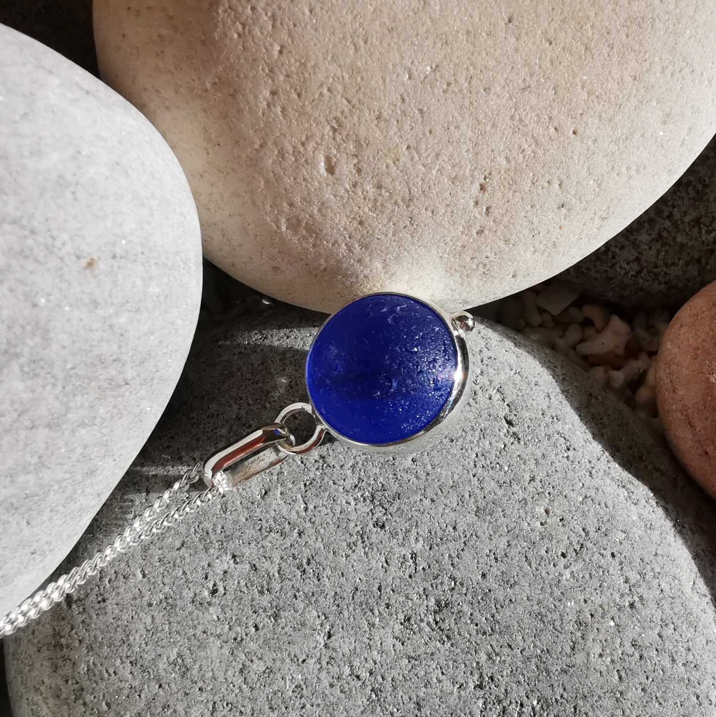 Scottish cobalt blue and white sea glass marble & sterling silver pendant.