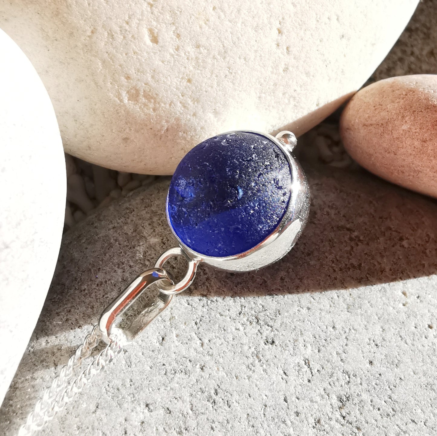 Scottish cobalt blue and white sea glass marble & sterling silver pendant.