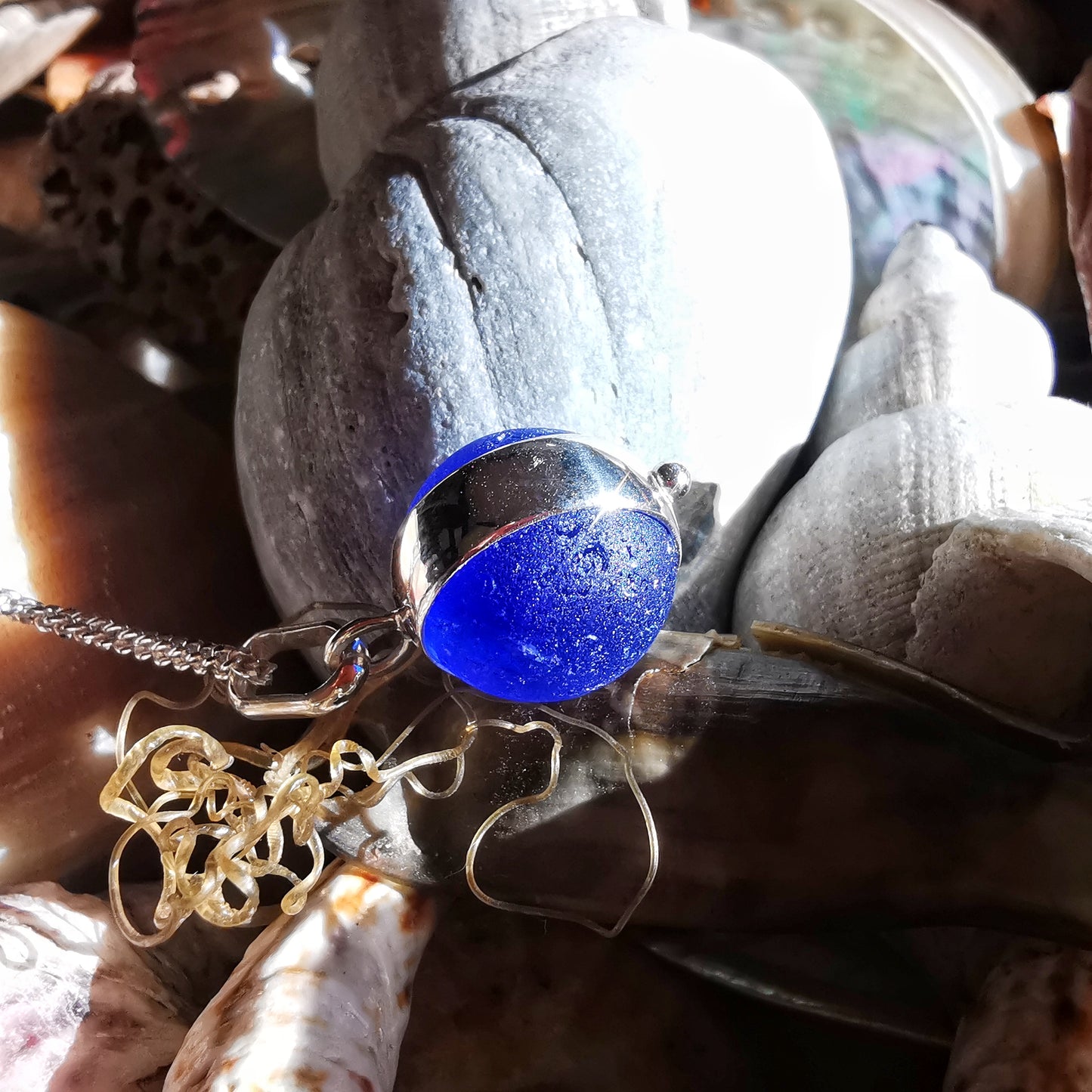 Scottish cobalt blue and white sea glass marble & sterling silver pendant.