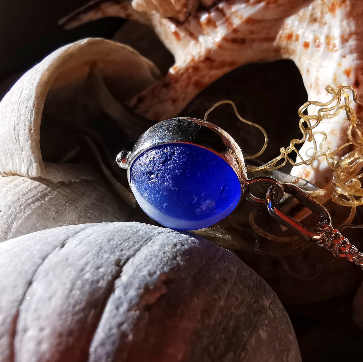 Scottish cobalt blue and white sea glass marble & sterling silver pendant.