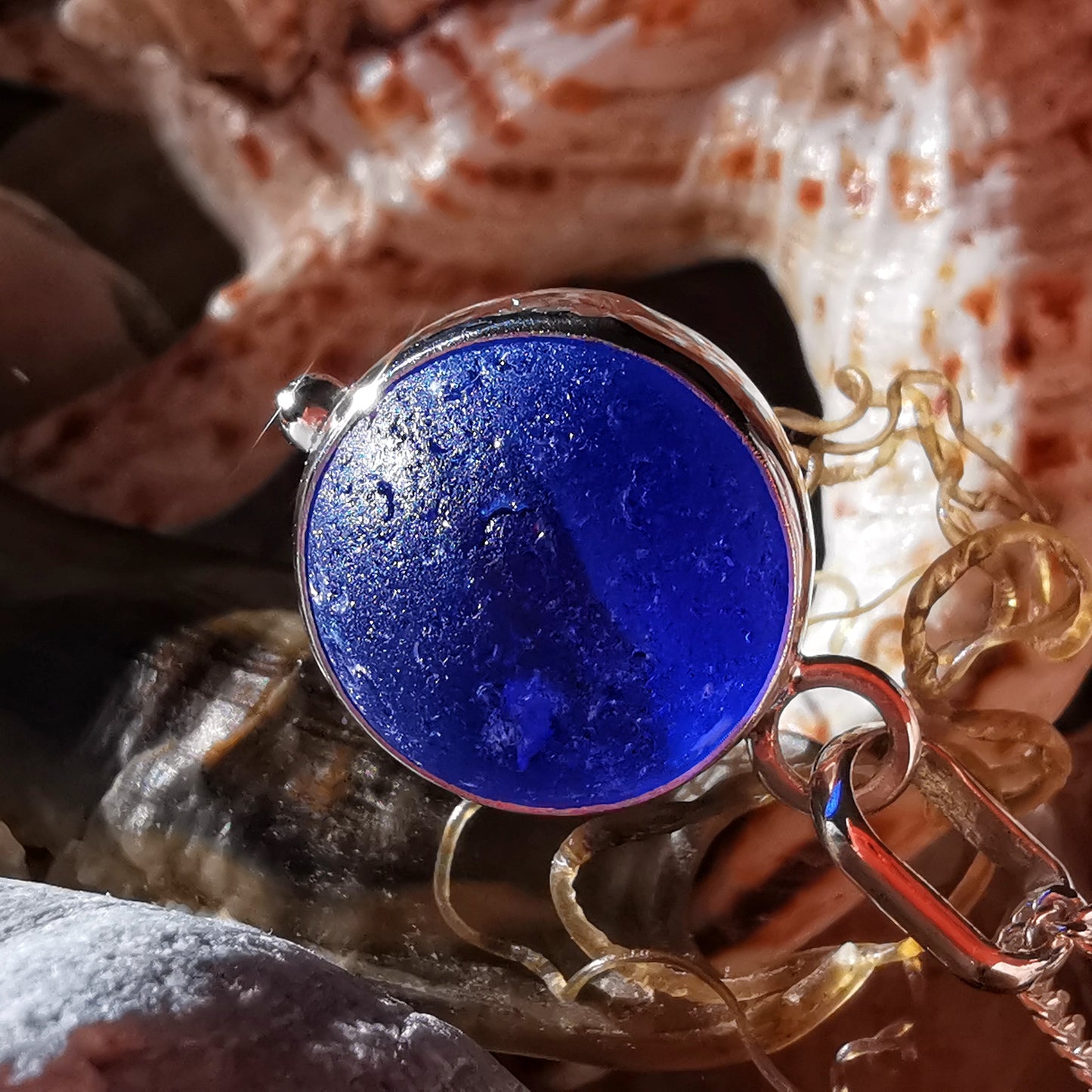 Scottish cobalt blue and white sea glass marble & sterling silver pendant.