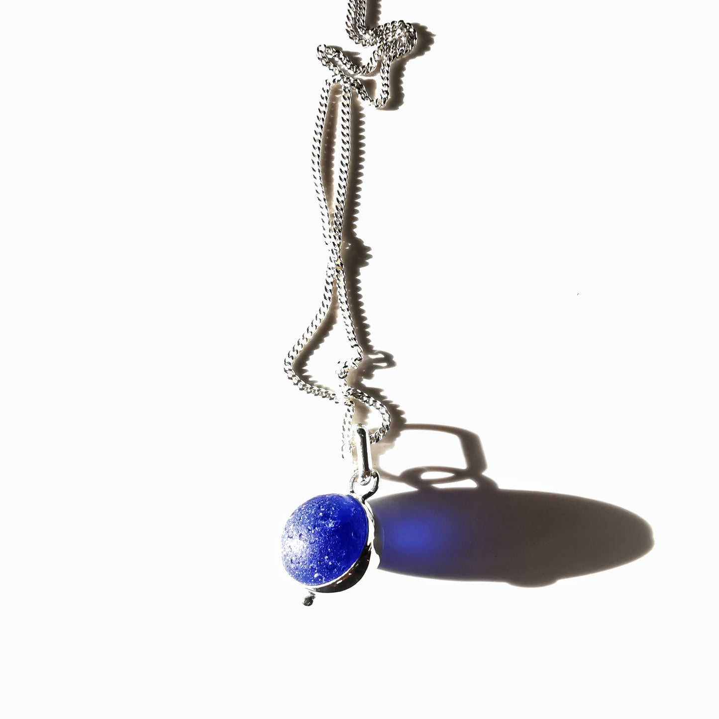 Scottish cobalt blue and white sea glass marble & sterling silver pendant.