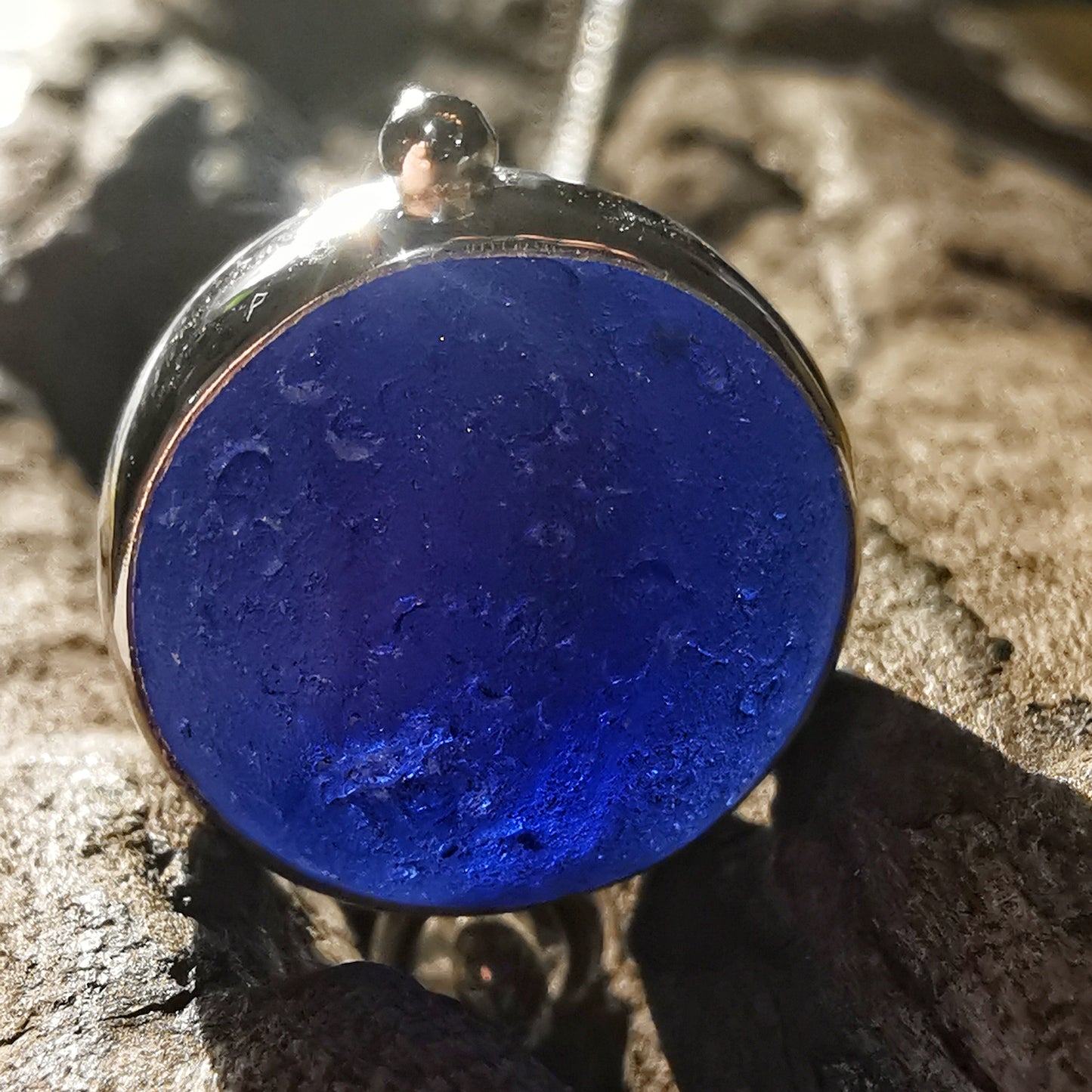 Scottish cobalt blue and white sea glass marble & sterling silver pendant.