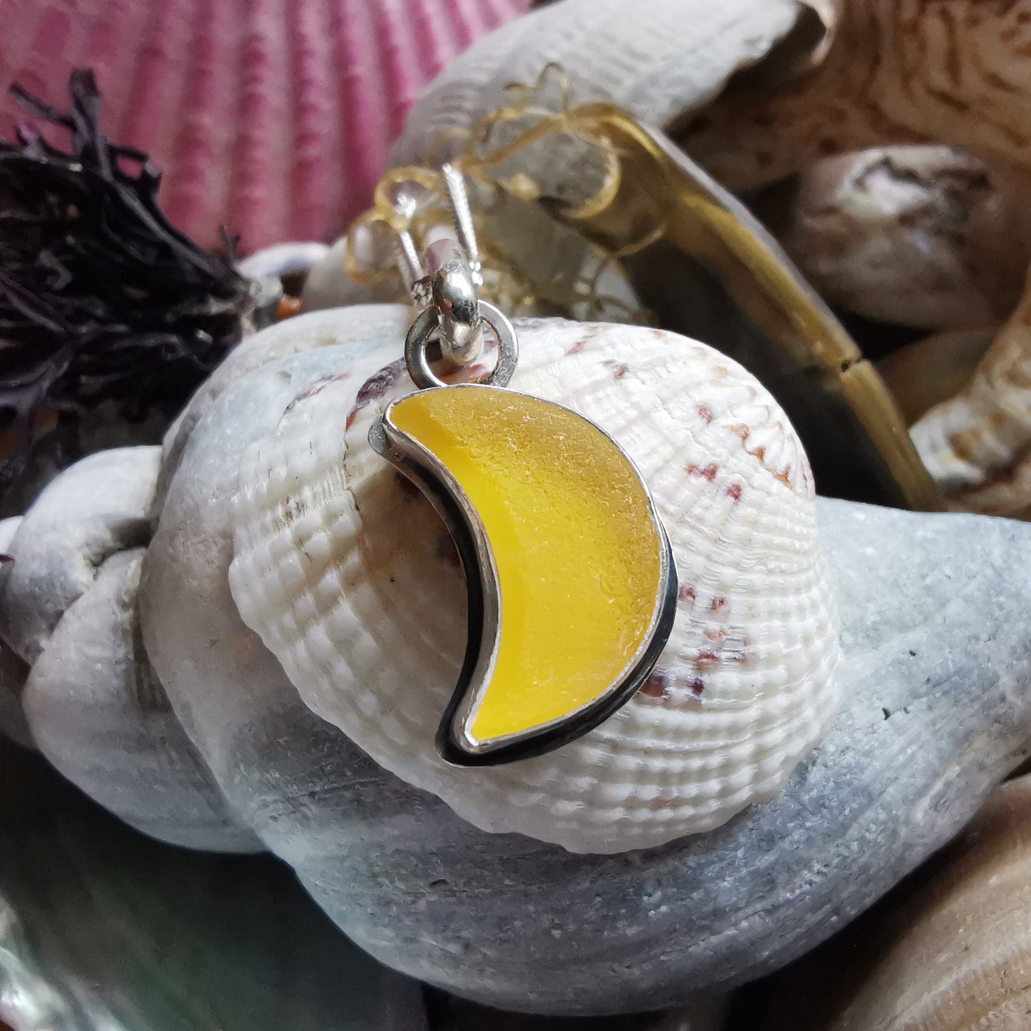 Yellow crescent moon sea glass & sterling silver pendant.