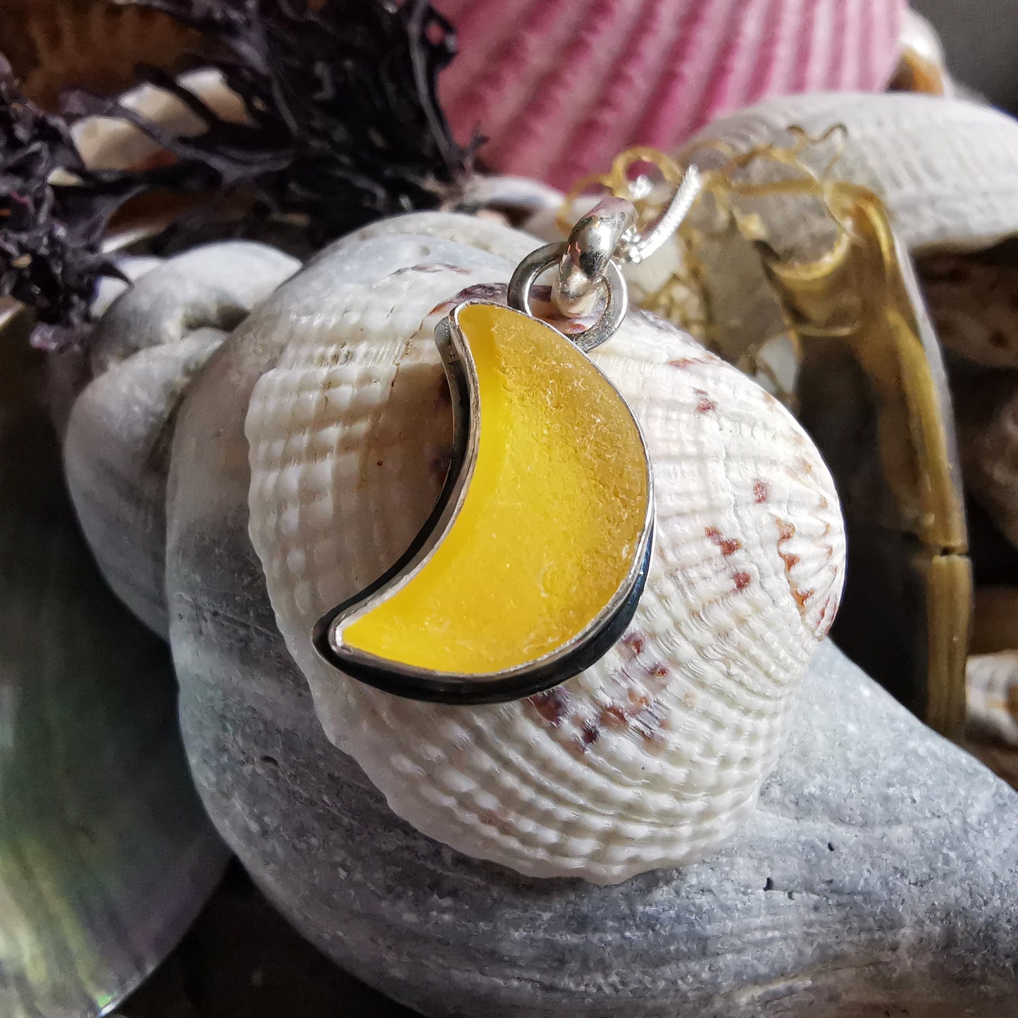Yellow crescent moon sea glass & sterling silver pendant.