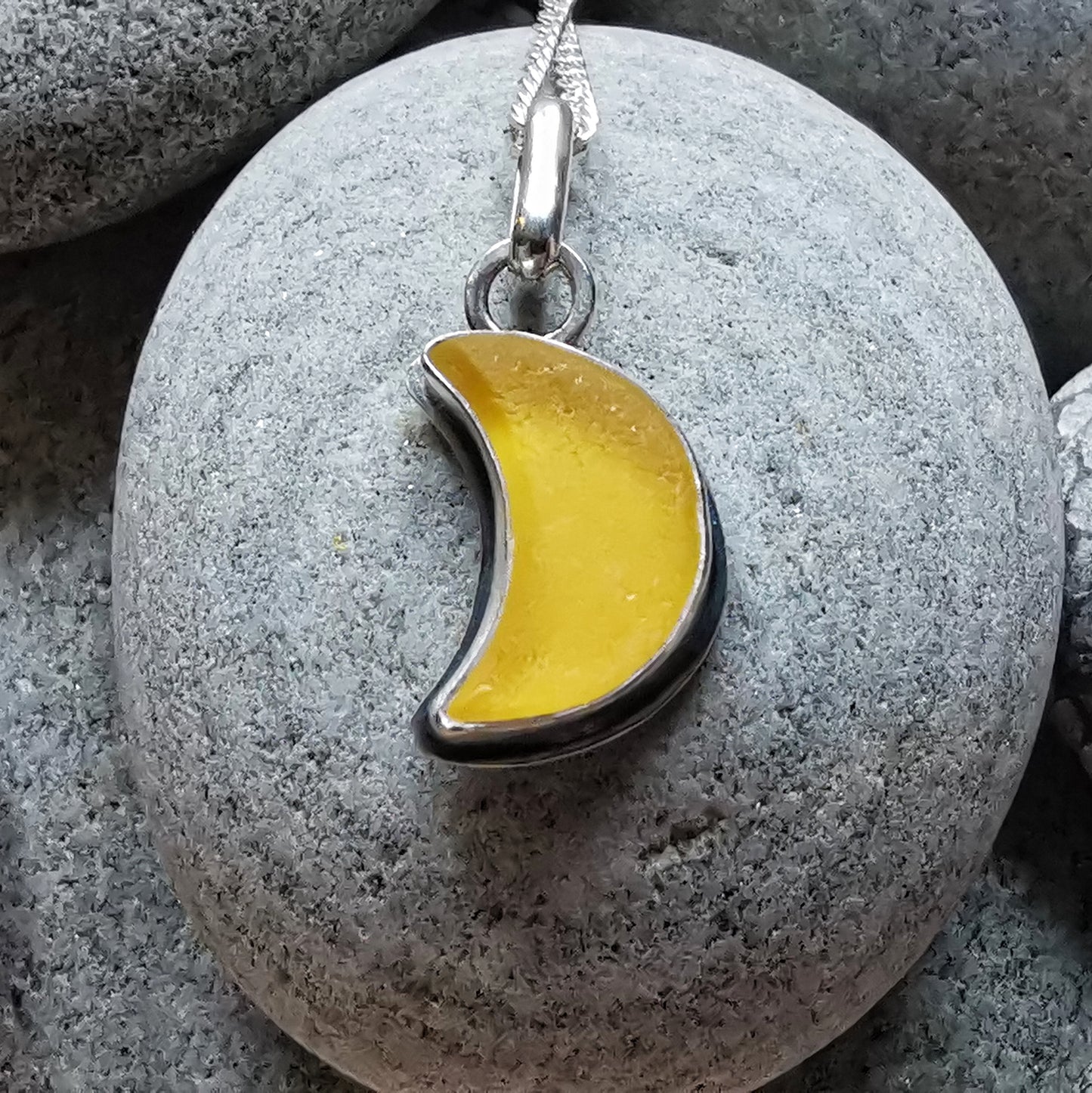 Yellow crescent moon sea glass & sterling silver pendant.