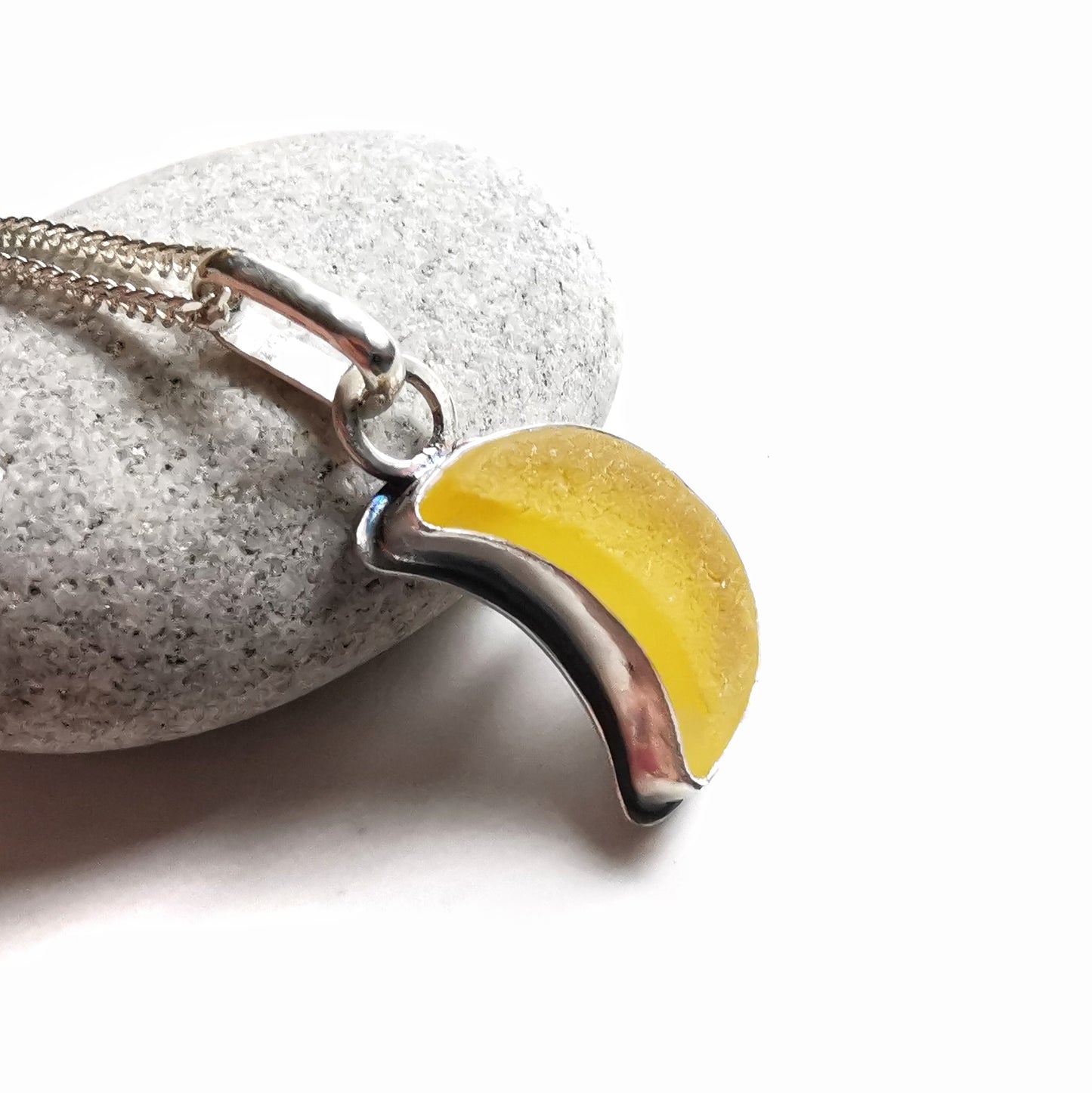 Yellow crescent moon sea glass & sterling silver pendant.