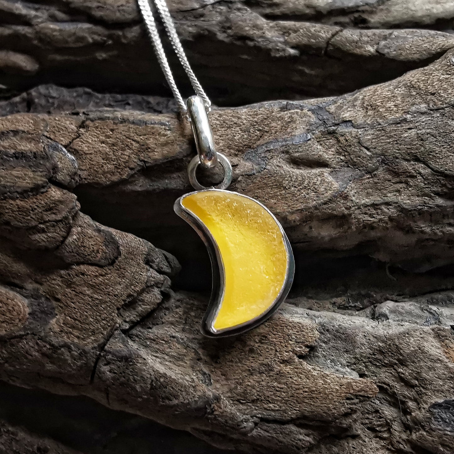 Yellow crescent moon sea glass & sterling silver pendant.