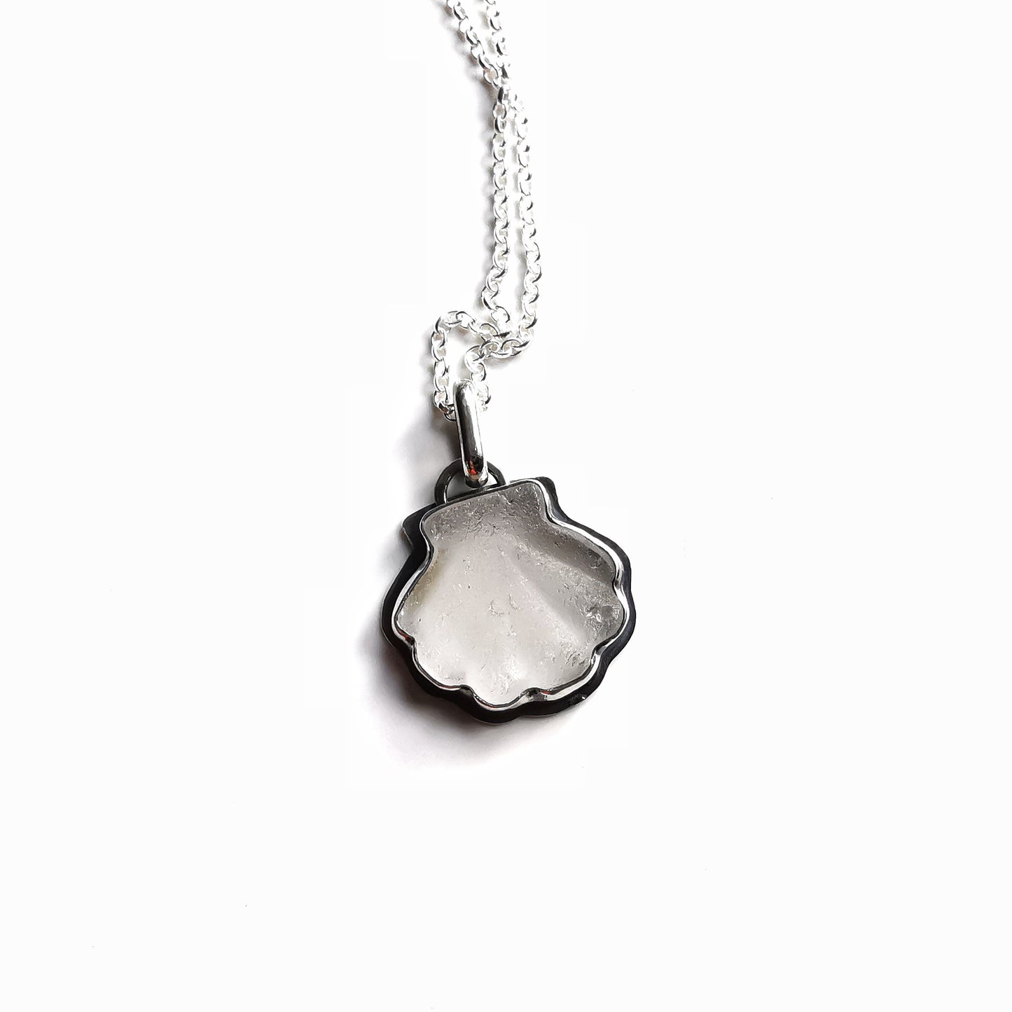 Scottish clear sea glass shell & sterling silver pendant.
