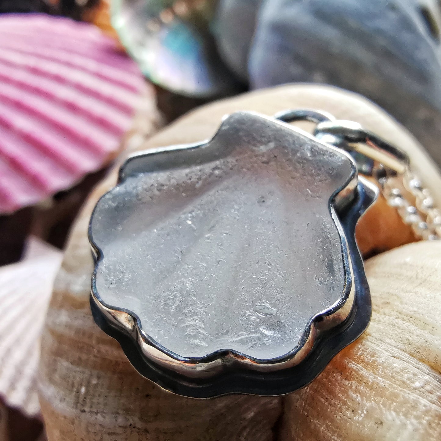 Scottish clear sea glass shell & sterling silver pendant.