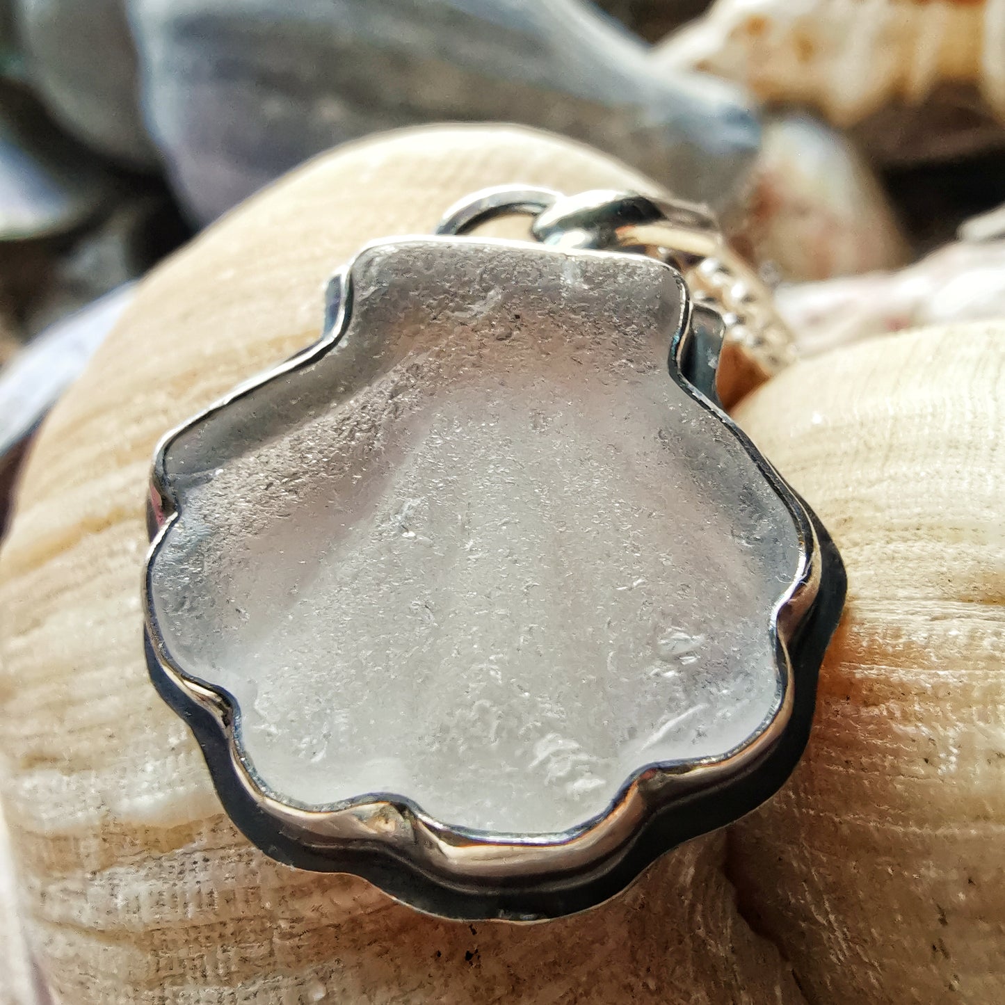 Scottish clear sea glass shell & sterling silver pendant.