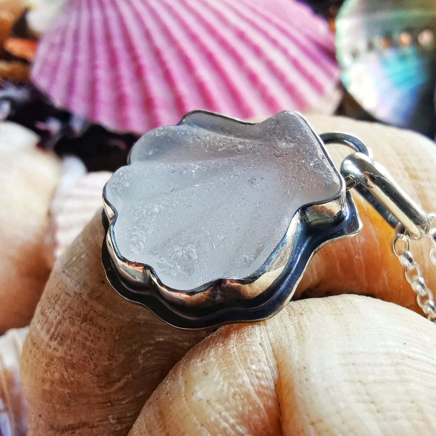 Scottish clear sea glass shell & sterling silver pendant.