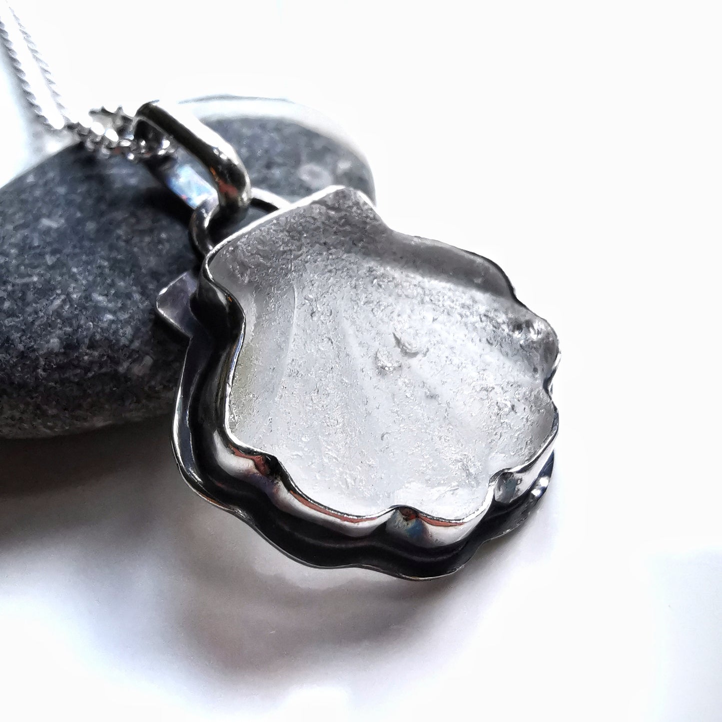 Scottish clear sea glass shell & sterling silver pendant.