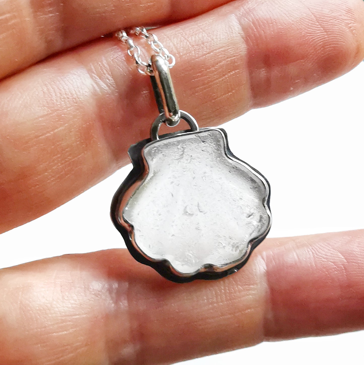 Scottish clear sea glass shell & sterling silver pendant.
