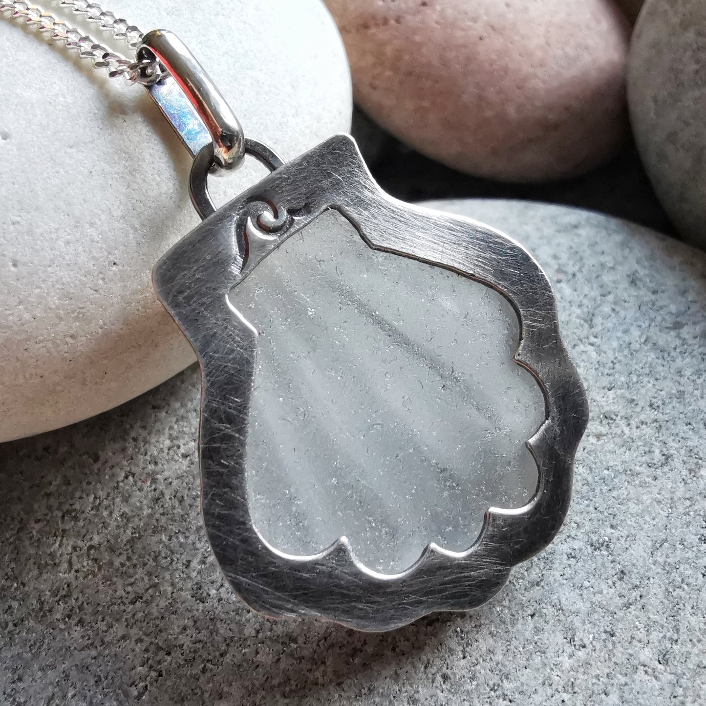Scottish clear sea glass shell & sterling silver pendant.