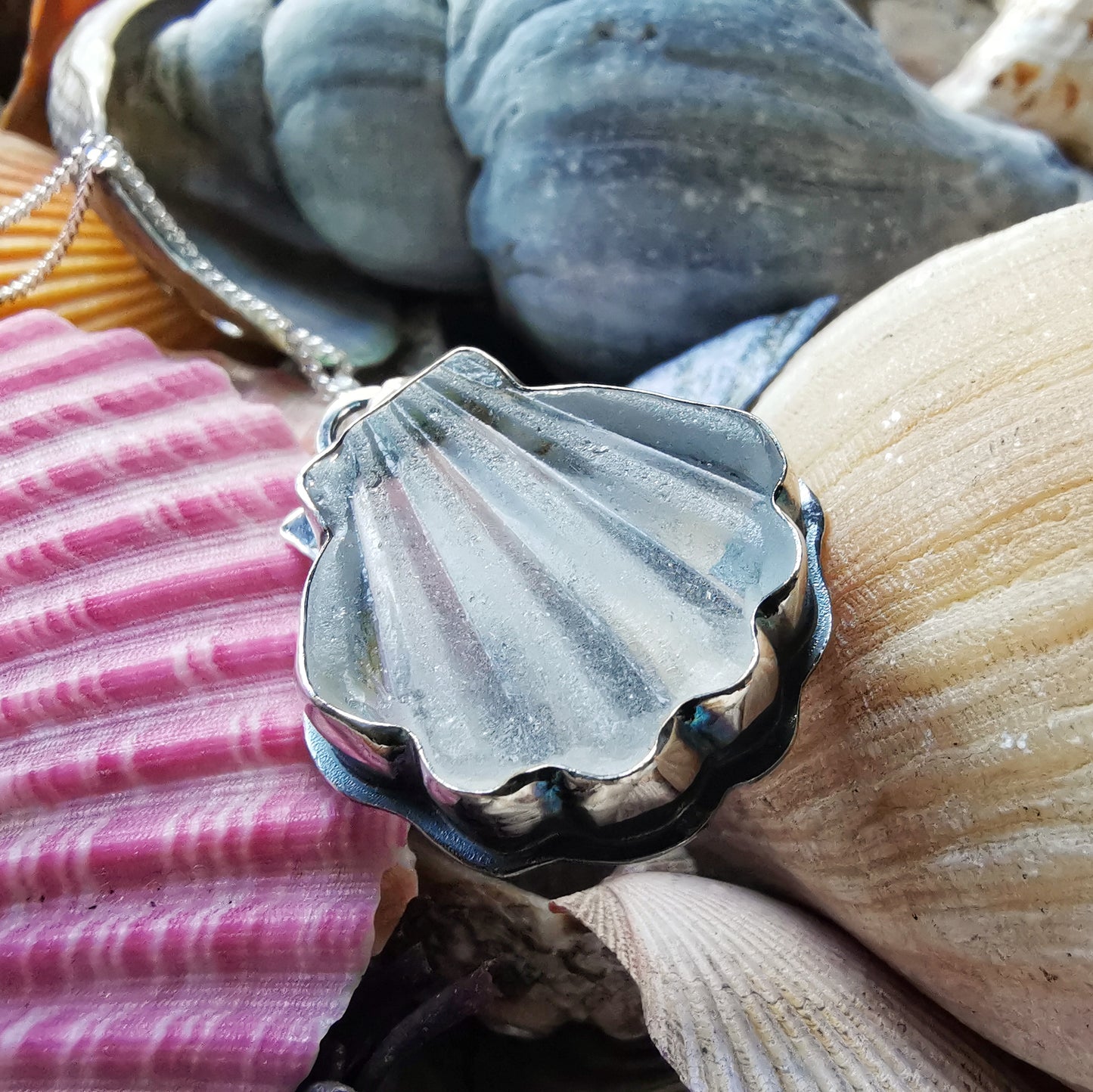 Scottish clear sea glass shell & sterling silver pendant.