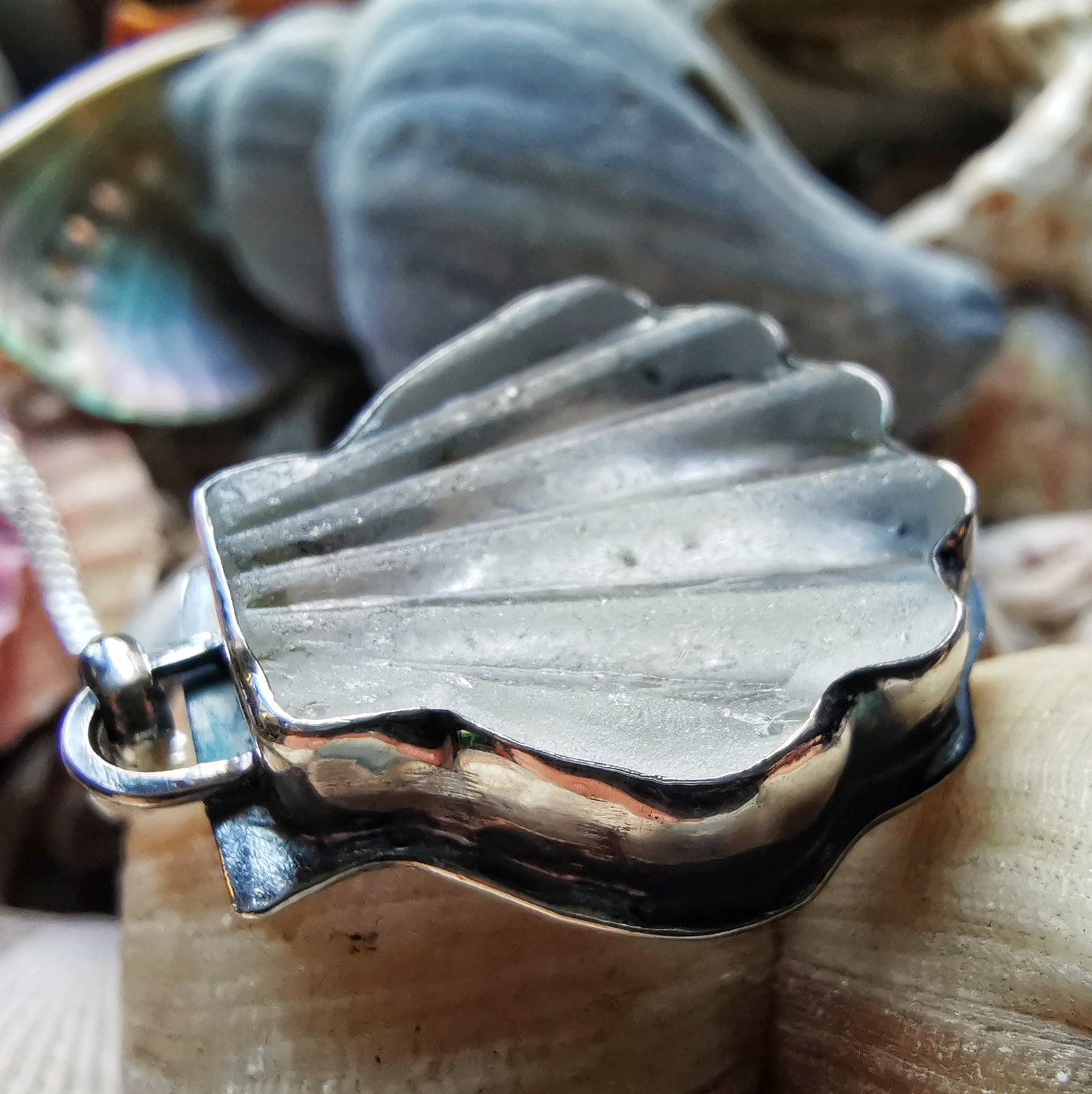 Scottish clear sea glass shell & sterling silver pendant.